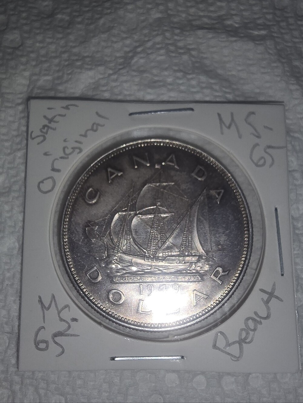 Spectacular 1949 MS-65 Uncirculated.